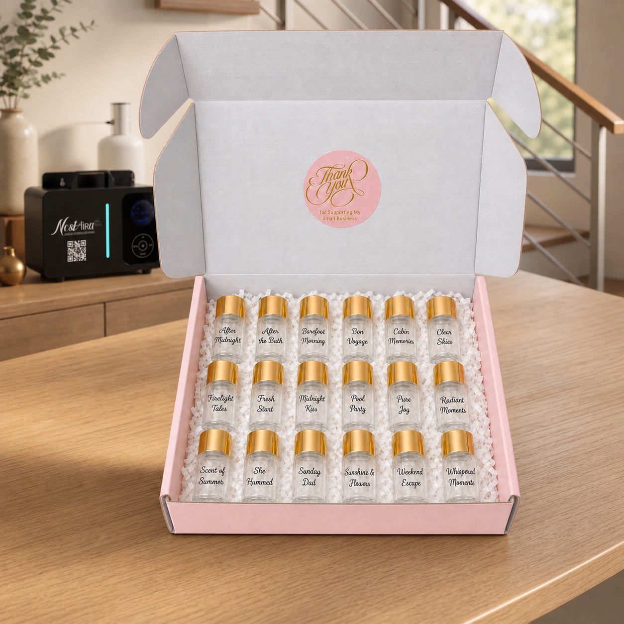 Nostaira fragrance sample vials arranged in a presentation box